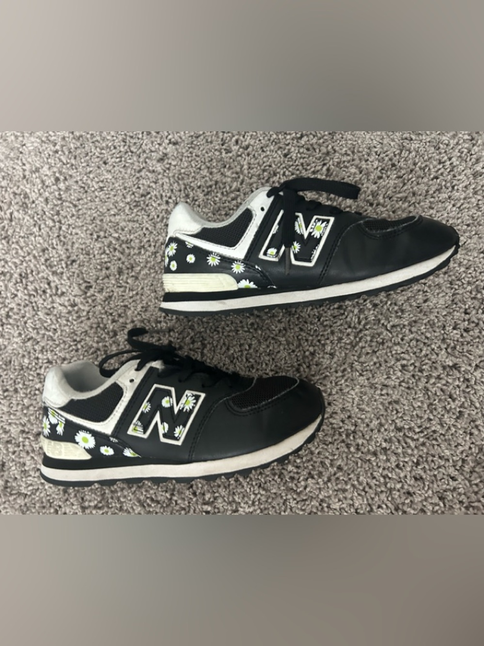 New Balance Kids Black Sneakers with White & Yellow Daisy Accents